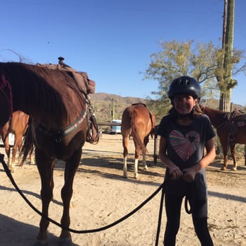 Way Out West Ranch - Nervous new rider was given many tasks to do to help her get ready to ride. - Horseback Riding Near Me - Marana, Arizona Way Out West Ranch - Nervous new rider was given many tasks to do to help her get ready to ride. - Horseback Riding Near Me - Marana, Arizona