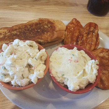 Southern Pig & Cattle - Stuart - This is the zesty BBQ chicken breasts, with potato salad, macaroni salad and garlic bread.  Sooo yummy! - Barbeque Near Me - Stuart, Florida
