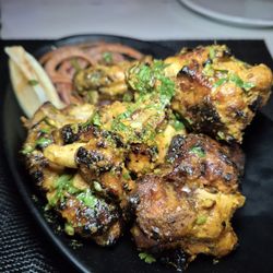JJ Sport Bar Restaurant - Tandoori wings. Such good flavor. Maybe needed a little more time to cook but I like wings a little crispy.
