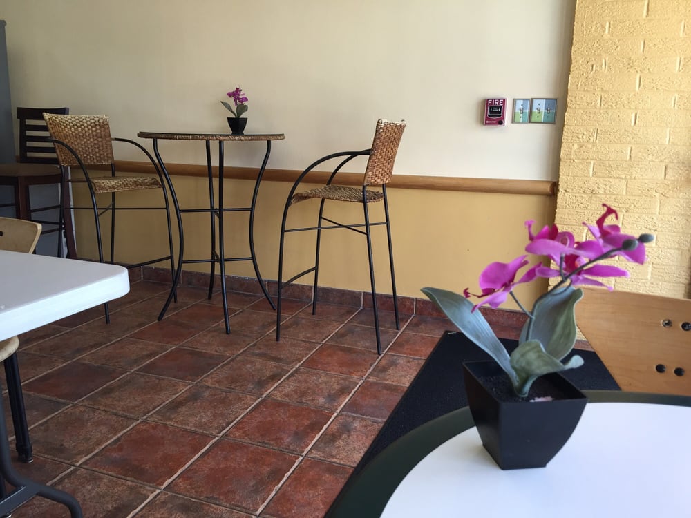 Seating area by the entrance Yelp