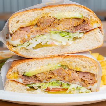 Taqueria El Arquito - two halves of a sandwich - Mexican Near Me - Irving, Texas Taqueria El Arquito - two halves of a sandwich - Mexican Near Me - Irving, Texas