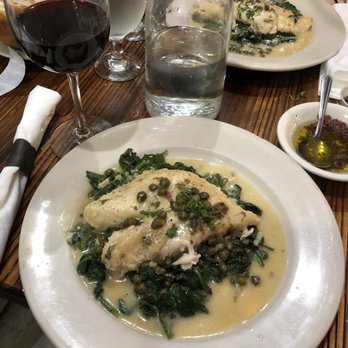 Tuscan Hills - Grouper over sautéed spinach and garlic - Italian Near Me - Forest Hills, New York Tuscan Hills - Grouper over sautéed spinach and garlic - Italian Near Me - Forest Hills, New York