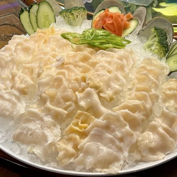 Congee Village - Geoduck sashimi.. what a knife skill.. - Cantonese Near Me - Flushing, New York Congee Village - Geoduck sashimi.. what a knife skill.. - Cantonese Near Me - Flushing, New York