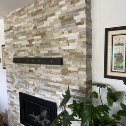 Kali Tile - Sheet brick tile fireplace with miters on the wraparound