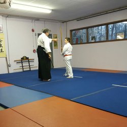Aikido Martial Arts Center-Heiwa Toushinkan Dojo - My son learning how to use the sword in aikido!