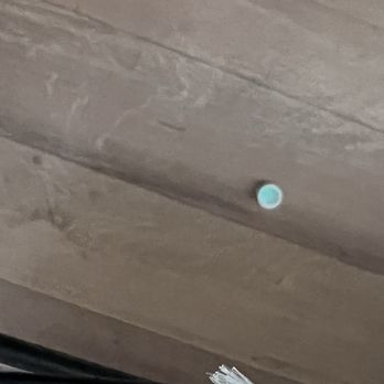 Smart Stay Inn - Tooth paste lid on the floor - Hotels Near Me - St. Augustine, Florida