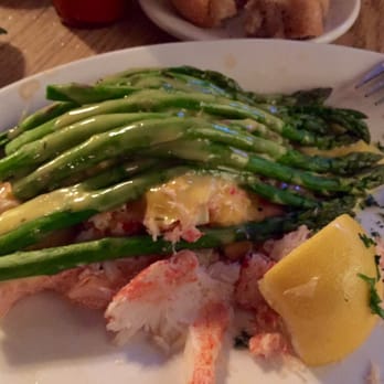 Pug Ryans Brewery - Salmon with crab and asparagus.  Kind of bland fish dish.  Just okay.  Get the trout or the rib eye! - American Near Me - Dillon, Colorado