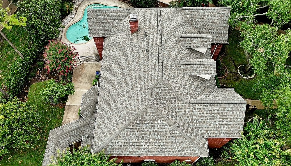 Slide of Bustamante Roofing and Construction