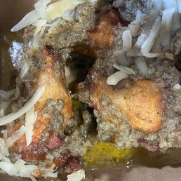 Garlic Parmesan Wings - Yes, there is chicken present underneath...along with a puddle of OIL!