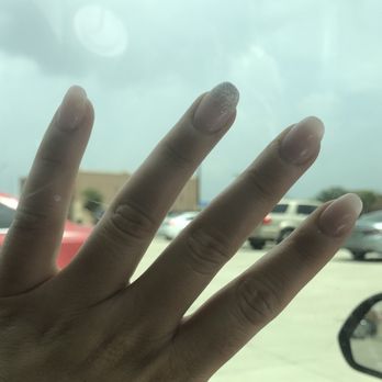 Mars & Venus Nail Salon - I asked for oval round dip in natural pink and one glitter ombré nail. 55$ total for shape, dip, tips/length. Done by Rin - Nail Salons Near Me - Forney, Texas