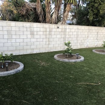 JJ Concrete & Landscaping - Installation of trees with paving blocks - Landscaping Near Me