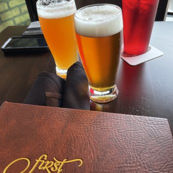 First Draft - two glasses of beer on a table - American Near Me - Grayslake, Illinois First Draft - two glasses of beer on a table - American Near Me - Grayslake, Illinois