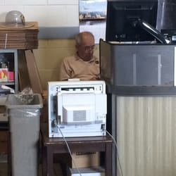 Photo of UPS Customer Center - Maspeth, NY, US. Very helpful sleeping employee.