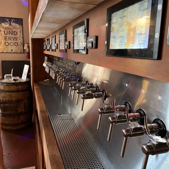 Wanderlust Wine Company - Downtown - Wine tap wall - Wine Bars Near Me - Austin, Texas