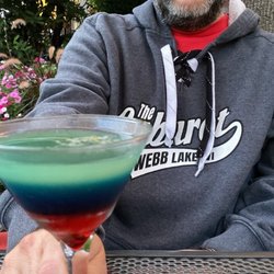 Twigs Tavern and Grille - My husband sampling a seasonal cocktail.