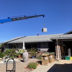 Rite Way Heating, Cooling & Plumbing: Sierra Vista - The crane getting rid of existing swamp cooler.