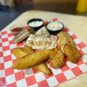 Butch's Pizza - a plate of food on a table - Pizza Near Me - Kimberly, Wisconsin Butch's Pizza - a plate of food on a table - Pizza Near Me - Kimberly, Wisconsin