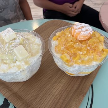 Snowl Cafe - Sweet Potato Cheese Cake Snow (left) - $16.40 Mango Snow (right) - $14.80  Prices as of 9/12/23, I'm sure subject to change. - Bubble Tea Near Me - Aurora, Colorado