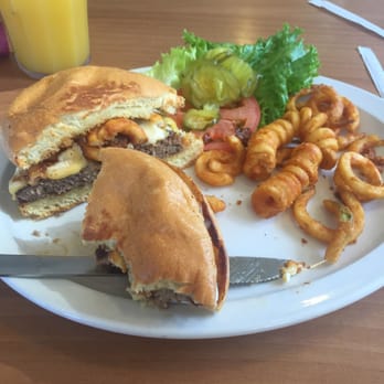 Jimmy's Egg - Burger with curly fries in it and BBQ sauce. Sauce was kinda tangy not so sweet. - Breakfast & Brunch Near Me - McAllen, Texas