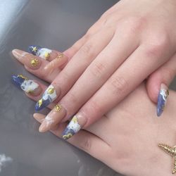 Luxury Nails and Spa - Tony did outstanding work on my daughter's nails. Her beach inspired theme is perfect for our upcoming cruise.