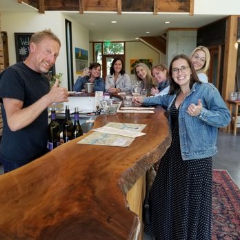 Viento Winery - a group of people enjoying a wine tasting - Wineries Near Me - Hood River, Oregon