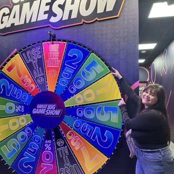 Great Big Game Show Houston - I had to take a picture of my 4'10" wife with the wheel. (She is wearing heeled shoes) - Venues & Event Spaces Near Me - Houston, Texas Great Big Game Show Houston - I had to take a picture of my 4'10" wife with the wheel. (She is wearing heeled shoes) - Venues & Event Spaces Near Me - Houston, Texas