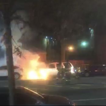 Flatbush Gardens - Fire fighters battling fire in front of Nostrand Playground. - Apartments Near Me - Brooklyn, New York