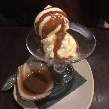 Frontera Grill - HOMEMADE ICE CREAMS Mexican vanilla bean (with white rum) with homemade cajeta (goat milk caramel) - Mexican Near Me - Chicago, Illinois
