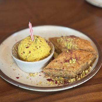 Delbar - Atlanta - Birthday Baklava w/ Persian ice cream (rose water, saffron & pistachio) - Middle Eastern Near Me - Atlanta, Georgia Delbar - Atlanta - Birthday Baklava w/ Persian ice cream (rose water, saffron & pistachio) - Middle Eastern Near Me - Atlanta, Georgia