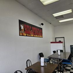 Taeza's Bottom Line Bbq - Logo in dining area