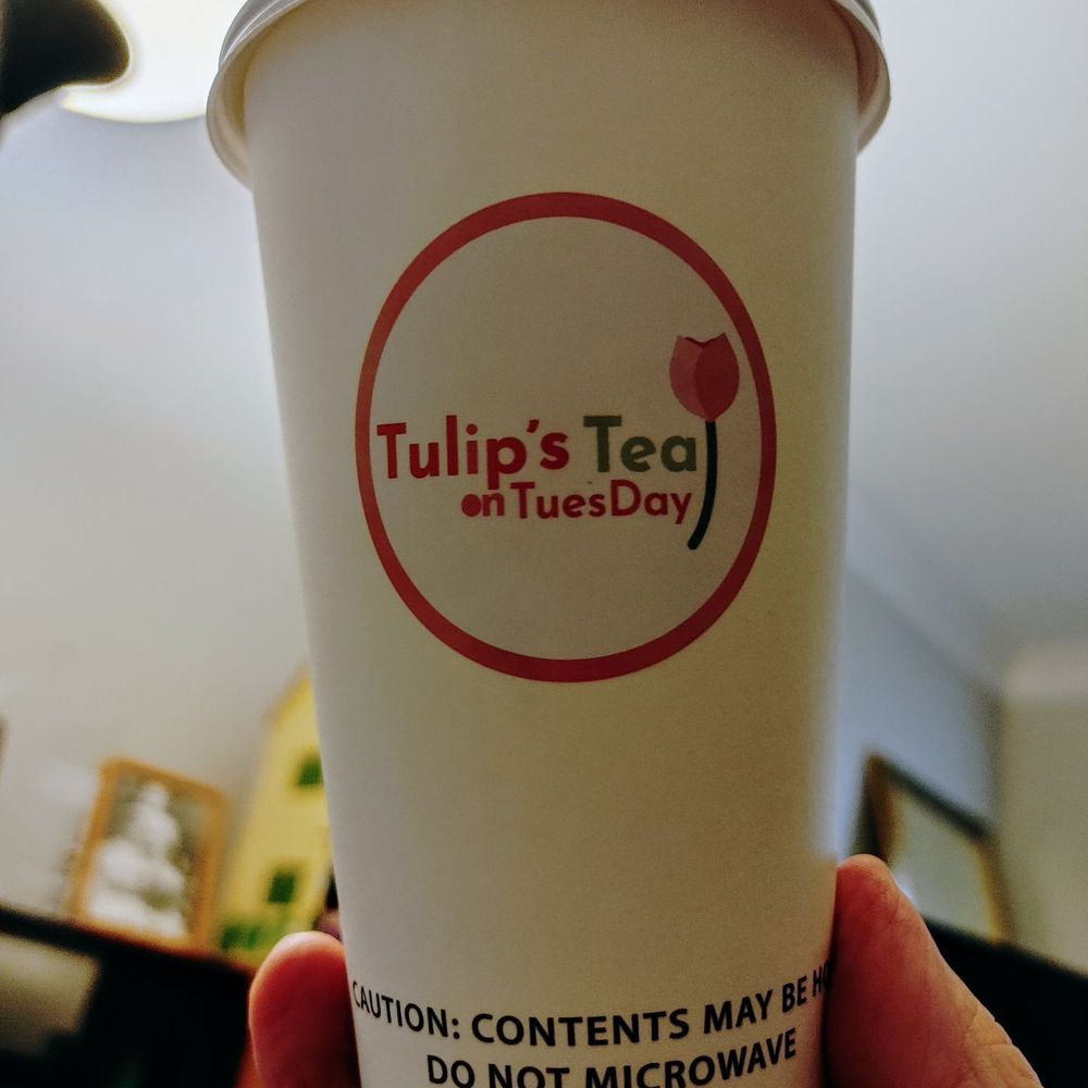 Tulip's Tea on TuesDay cup with logo
