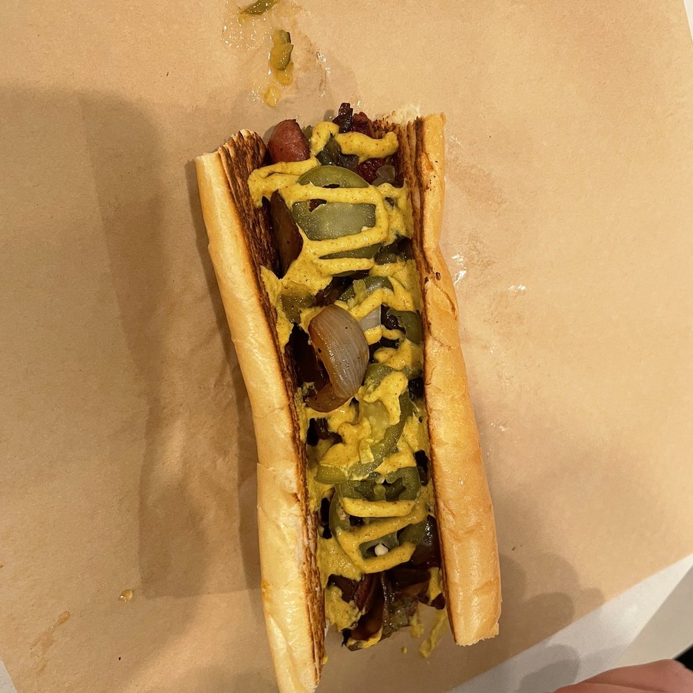 Polish with relish jalapeños grilled onions and mustard Polish with relish jalapeños grilled onions and mustard