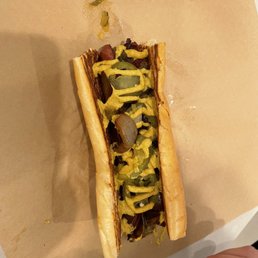 Polish with relish jalapeños grilled onions and mustard Polish with relish jalapeños grilled onions and mustard