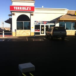 a car parked in front of a restaurant