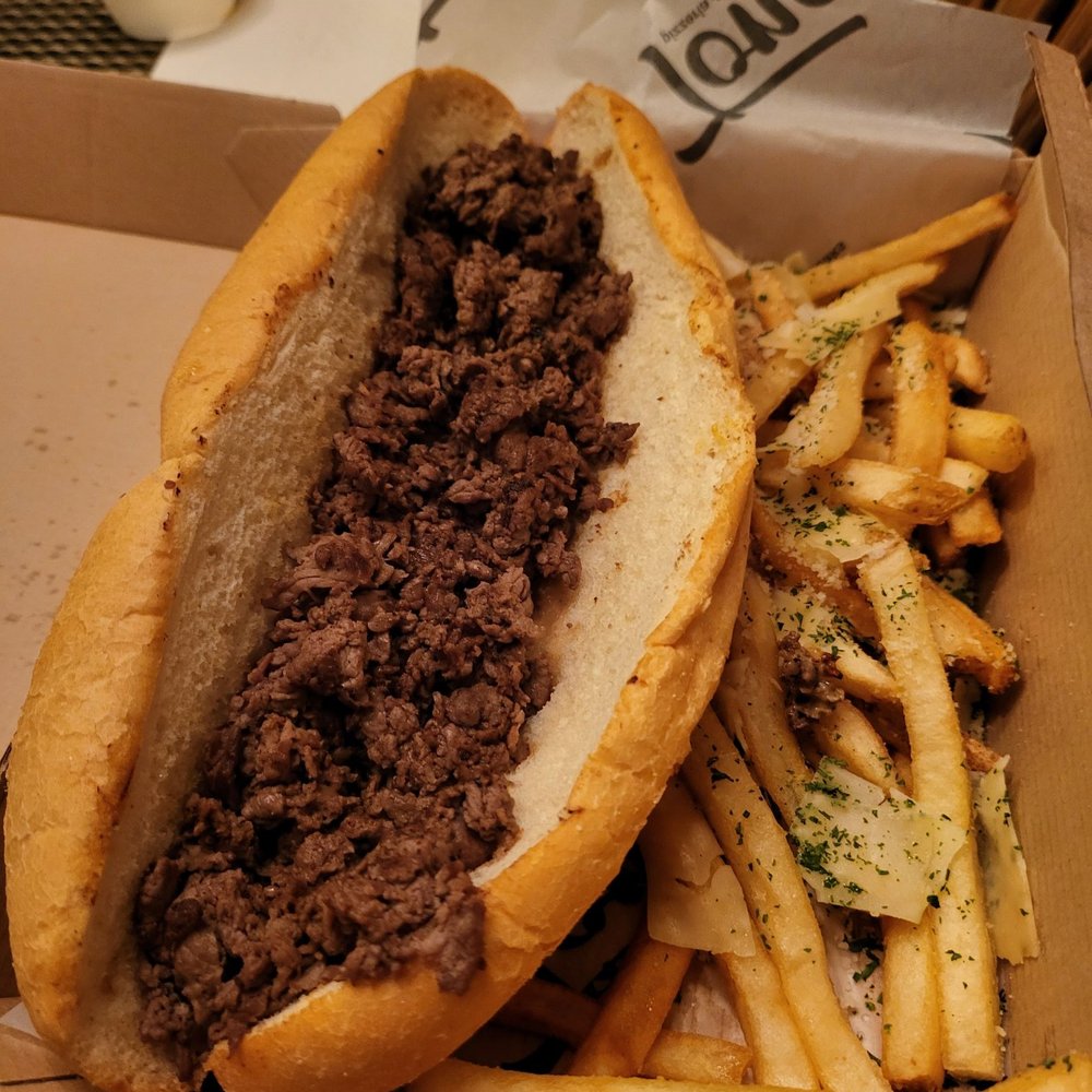 Tono Pizzeria + Cheesesteaks - A Cheesesteak with no cheese?  There was a tiny amount hidden underneath.  And the meat was unseasoned. - Pizza Near Me - Coon Rapids, Minnesota
