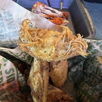 Wingstop - Flat with feathers still attached - Chicken Wings Near Me - Antelope, California Wingstop - Flat with feathers still attached - Chicken Wings Near Me - Antelope, California