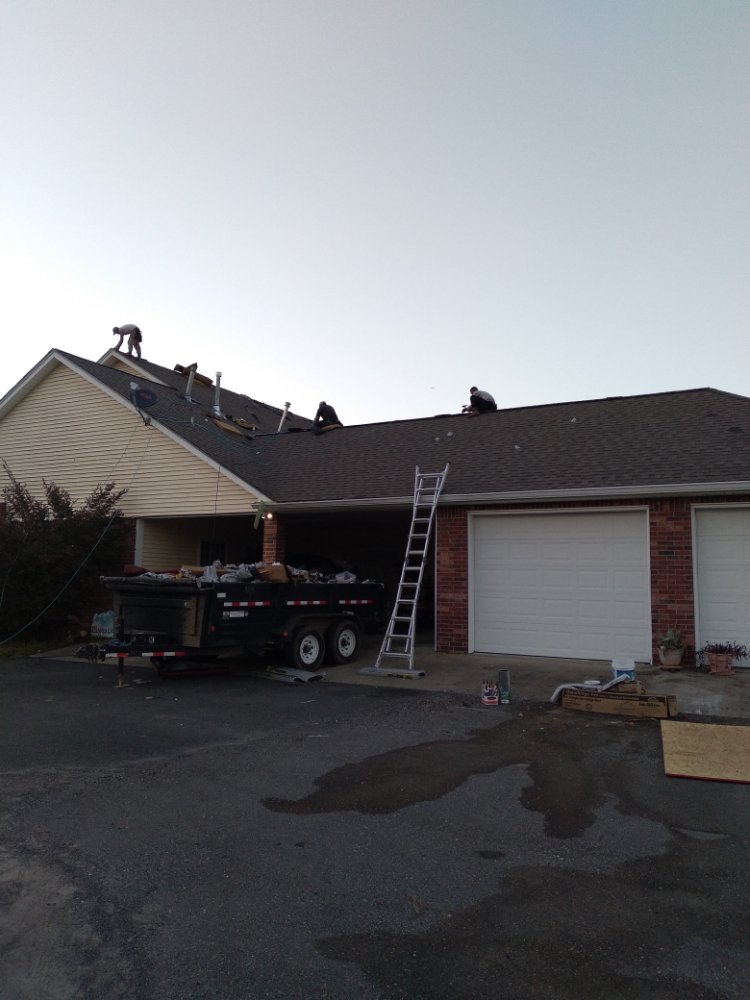 Slide of J&K Roofing Company