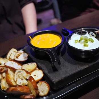Black Rock Bar & Grill - Black Rock Dueling Pretzel and Cheese Fondue - Bars Near Me - Tampa, Florida Black Rock Bar & Grill - Black Rock Dueling Pretzel and Cheese Fondue - Bars Near Me - Tampa, Florida