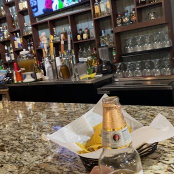 Senor Taco - a person holding a bottle of modelo - Mexican Near Me - Knoxville, Tennessee Senor Taco - a person holding a bottle of modelo - Mexican Near Me - Knoxville, Tennessee