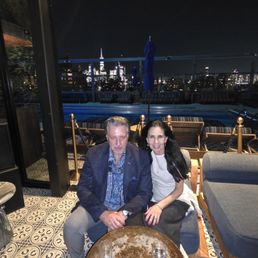 ROSARIO S. CASSATA AND CAROLYN AT THE GANSEVOORT ROOFTOP RESTAURANT IN THE MEATPACKING DISTRICT OF NYC. ROSARIO S. CASSATA AND CAROLYN AT THE GANSEVOORT ROOFTOP RESTAURANT IN THE MEATPACKING DISTRICT OF NYC.