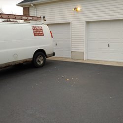 EZ slide overhead doors - Install garage doors in Freehold New Jersey. 1/10/23