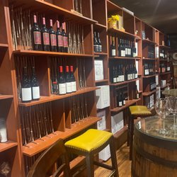 Vino Simpatico - One of the walls with different reds.