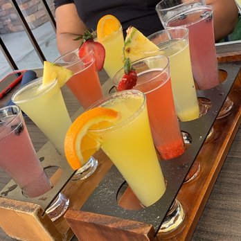 Hash Kitchen - Mimosa flight with the cotton candy glitter bomb - Breakfast & Brunch Near Me - Chandler, Arizona