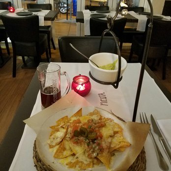 Micota - Delicious nachos!  This is a half order, perfect appetizer for one. - Barbeque Near Me - Madrid, M