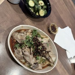 Lamb noodles. Cucumber salad. Not so spicy chili sauce. Lamb noodles. Cucumber salad. Not so spicy chili sauce.