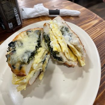The Bagel Barn Cafe and Deli - Spinach asiago bagel egg sandwich - Bagels Near Me - Edgewater, Florida
