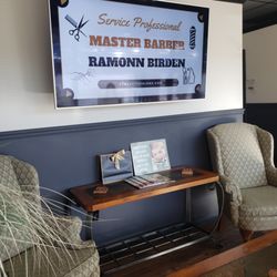 XtraSuite Salon Studios - Waiting area promoting master barber