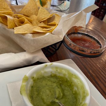 Madfish Grill - Homemade chips, guacamole and salsa- a little messy because I couldn't wait - Seafood Near Me - Sarasota, Florida Madfish Grill - Homemade chips, guacamole and salsa- a little messy because I couldn't wait - Seafood Near Me - Sarasota, Florida
