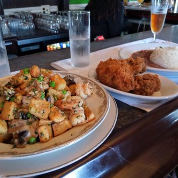 Dooky Chase's Restaurant - Shrimp Clemenceau (left front) and red beans and rice with fried chicken (right back) - Cajun/Creole Near Me - New Orleans, Louisiana