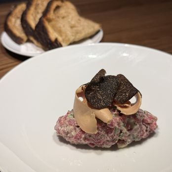 Asador Bastian - Black truffle beef tartare - Spanish Near Me - Chicago, Illinois Asador Bastian - Black truffle beef tartare - Spanish Near Me - Chicago, Illinois